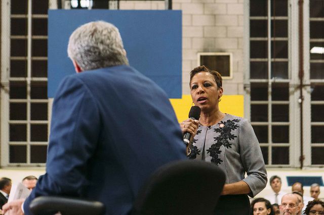 Queens Councilmember Adrienne Adams, the chair of the public safety committee, speaks into a microphone at a town hall meeting with Mayor Bill de Blasio in 2019.